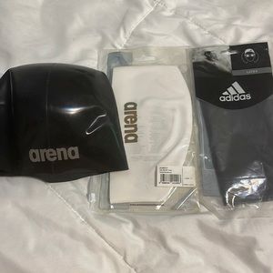 3 swim caps.